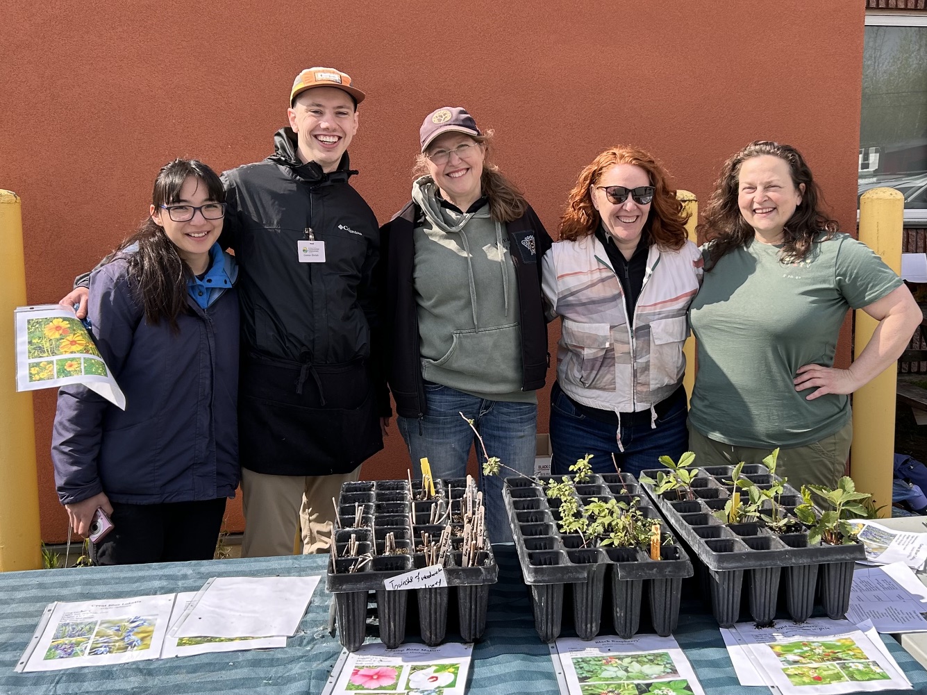 Janet Cox with volunteers at a TWEEC native plant sale